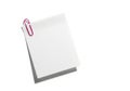 Blank white paper stack held together by a red paperclip Royalty Free Stock Photo