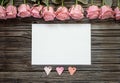 Blank white paper with three hearts and roses Royalty Free Stock Photo