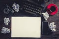 Blank white paper on the wooden table