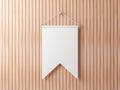 Blank White pennant hanging on wooden wall