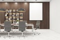 Blank white picture frame in modern meeting room with wooden decoration interior design and marble floor. Mock up Royalty Free Stock Photo