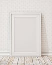 Blank white picture frame on the wall and the floor Royalty Free Stock Photo
