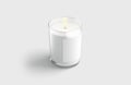 Blank white pillar candle in glass jar with label mockup