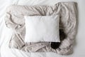 Blank White Pillow Mockup On a Grey Patterned Duvet Background With Pine Cones