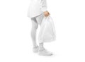 Blank white plastic bag mockup holding hand Royalty Free Stock Photo