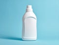 Blank White Plastic Bottle with Cap on Blue Background Keywords: bottle, plastic, white, blank, empty, container Royalty Free Stock Photo