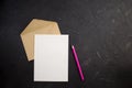 Blank white postcard postcard flyer. Envelope kraft whith pensil. Flat lay.