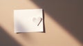 Blank white postcard lying on the table, around the heart made of paper, play of light and shadow, flat lay