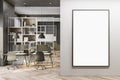 Blank white poster in black frame with copyspace for your logo on light wall in co-working office with modern design workspaces, Royalty Free Stock Photo