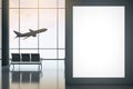 Blank white poster on black wall in waiting area airport hall and taking off airplane outside glass wall. 3D rendering Royalty Free Stock Photo