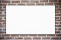 Blank white poster and brick wall background Royalty Free Stock Photo