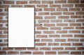 Blank white poster and brick wall background Royalty Free Stock Photo
