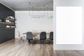 Blank white poster with empty place on light grey wall in modern conference room with bookshelves, stylish conference table