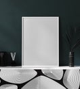 Blank white poster and picture frame in luxury contemporary interior with dark green wall, minimalistic, 3d rendering Royalty Free Stock Photo