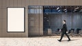 Blank white poster on a wall of business center and walking on a street businessman