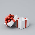 Blank white present box open or opened gift box with red ribbons and bow on white grey background with shadow minimal Royalty Free Stock Photo