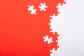 Blank white puzzle pieces on red background, flat lay Royalty Free Stock Photo