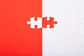 Blank white puzzle pieces on red background, flat lay Royalty Free Stock Photo