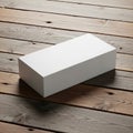 Blank white rectangular box on rustic wooden surface Royalty Free Stock Photo