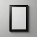 A blank white rectangular canvas is surrounded by a simple black frame, set against a neutral gray Royalty Free Stock Photo