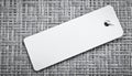 Blank white rectangular tag with string on woven textured background label empty Royalty Free Stock Photo