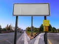 Blank white road sign on the background of a city road in Ankara Turkey. Empty template-mockup of a waymark on a town street on