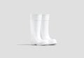 Blank white rubber wellington boots mock up, half-turned view