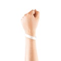 Blank white rubber wristband mockup on hand, Royalty Free Stock Photo