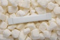 Blank white sachet stick pack on sugar cubes. 3D rendering and photo