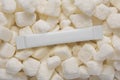 Blank white sachet stick pack on sugar cubes. 3D rendering and photo Royalty Free Stock Photo