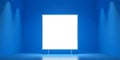 A blank white screen in a blue room with two spotlights shining on either side of it Royalty Free Stock Photo