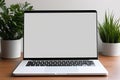 Blank white screen with laptop computer mockup isolated on office desk background Royalty Free Stock Photo