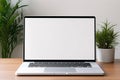 Blank white screen with laptop computer mockup isolated on office desk background Royalty Free Stock Photo