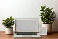 Blank white screen with laptop computer mockup isolated on office desk background Royalty Free Stock Photo