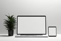 Blank white screen with laptop computer mockup isolated on office desk background Royalty Free Stock Photo