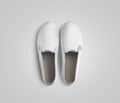 Blank white slip-on shoes pair design mockup, top view,