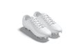 Blank white soccer boots pair with rubber cleats mockup, isolated