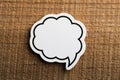 Blank White Speech Bubble Paper On Wooden Background