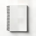 Blank white spiral-bound notebook mockup. Stylish, modern object for note-taking sketching. Versatile product image suitable for