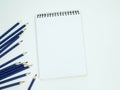 Blank white spiral bound paper drawing pad with color pencil. Is Royalty Free Stock Photo