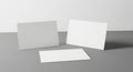 Blank white square and rectangular cards on a gray surface Royalty Free Stock Photo