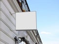 Blank white square sign on wall mock up, sky background