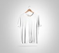Blank white t-shirt on hanger, design mockup, clipping path Royalty Free Stock Photo