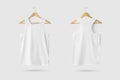 Blank White Tank Top Shirt mockup on wooden hanger isolated on light grey background front and rear side view. Royalty Free Stock Photo