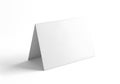 Blank white tent card standing on a white surface ready for custom design Royalty Free Stock Photo