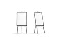 Blank white vertical canvas stand on black easel mockup, isolated