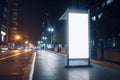 Blank white vertical digital billboard poster on city street bus stop sign at night. AI generated Royalty Free Stock Photo