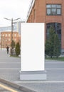 Blank white vertical pylon stand mock up brick building background