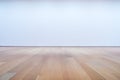 Blank white wall and hardwood floor in art gallery Royalty Free Stock Photo