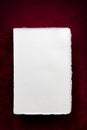 Blank White Writing Paper over Rich Red Background Royalty Free Stock Photo